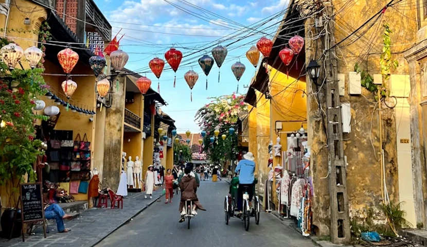a street lined with yellow buildings Hoi An
