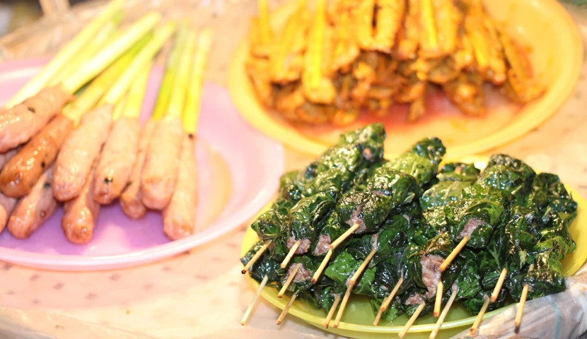 plates of food covered in greens Hoi An